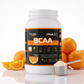 Pro-Vital BCAA Powder 2:1:1 sabor laranja com fatias de laranja e scoop de pó em fundo branco com reflexo.