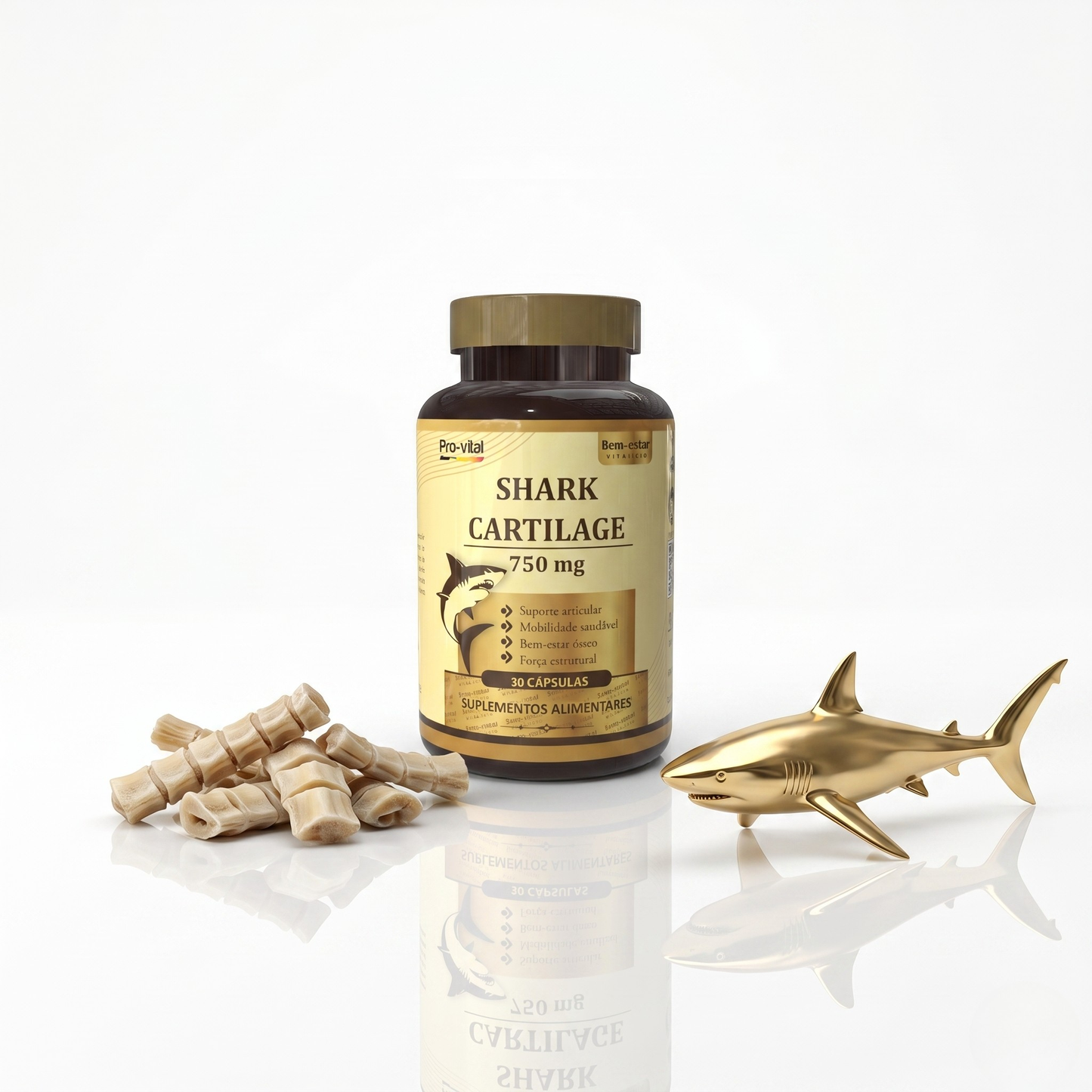 Frasco de Cartilagem de Tubarão 750mg Pro-vital de 30 cápsulas, ao lado de pequenos ossos de cartilagem e uma miniatura dourada de tubarão num fundo branco.
