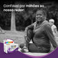 Mulher sénior ativa a praticar ioga no parque com o multivitamínico Pro-vital Mulheres 50+, ideal para vitalidade e saúde em Angola.